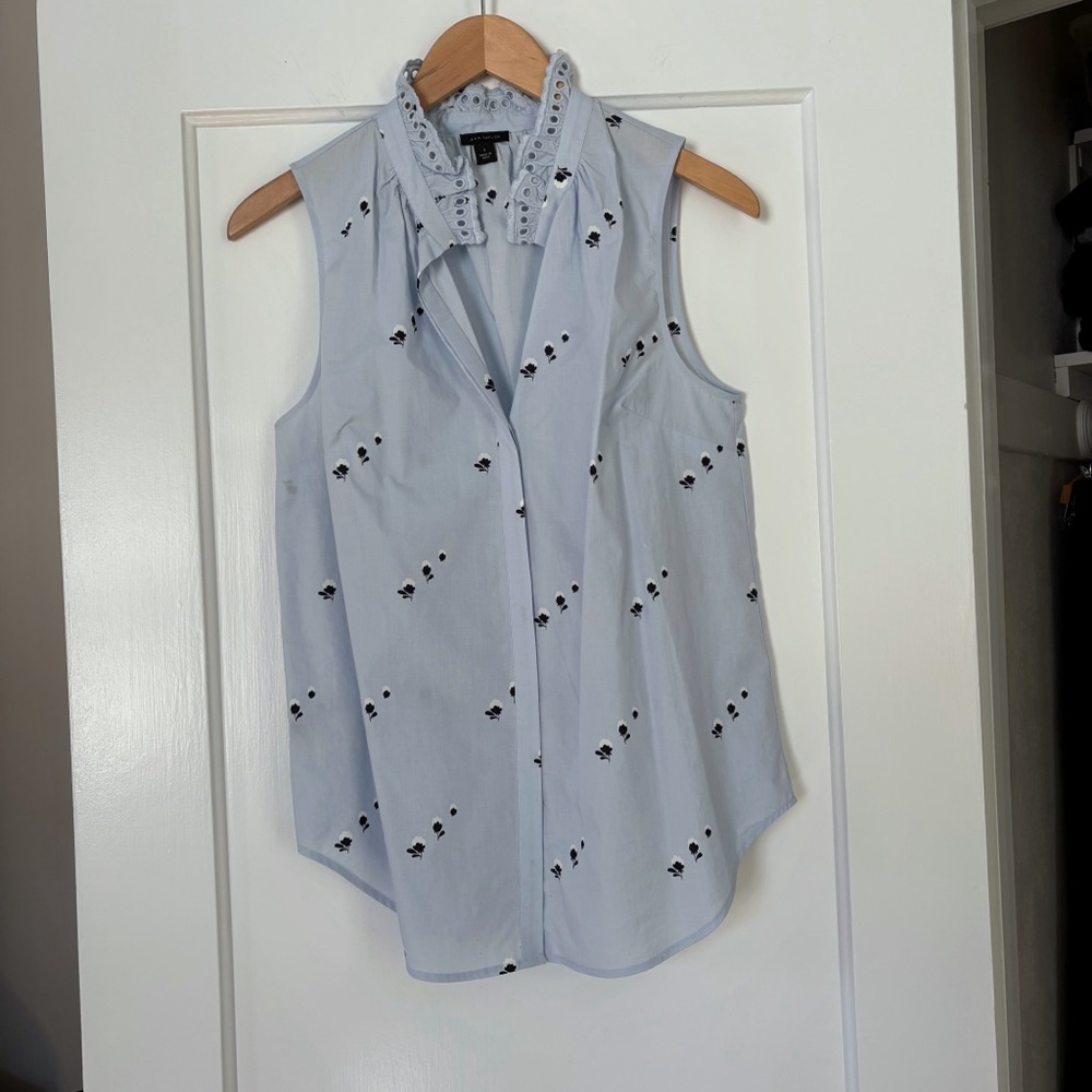 Ann Taylor Light Blue Sleeveless Blouse with Small Black Floral Pattern